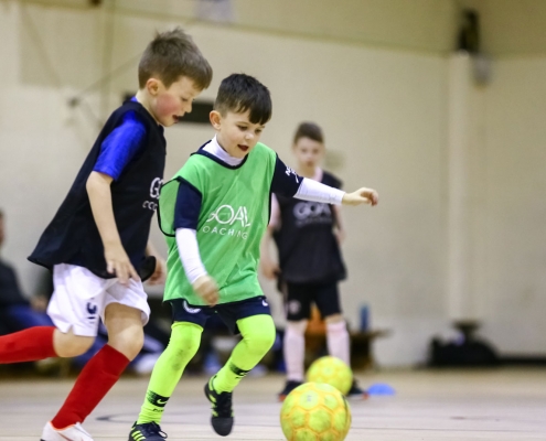 Boys playing futsal