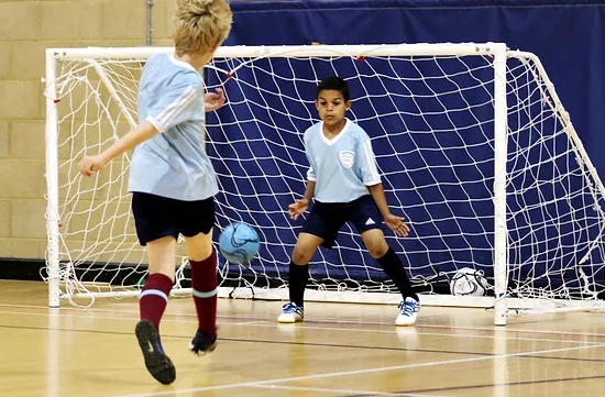 Children playing futsal